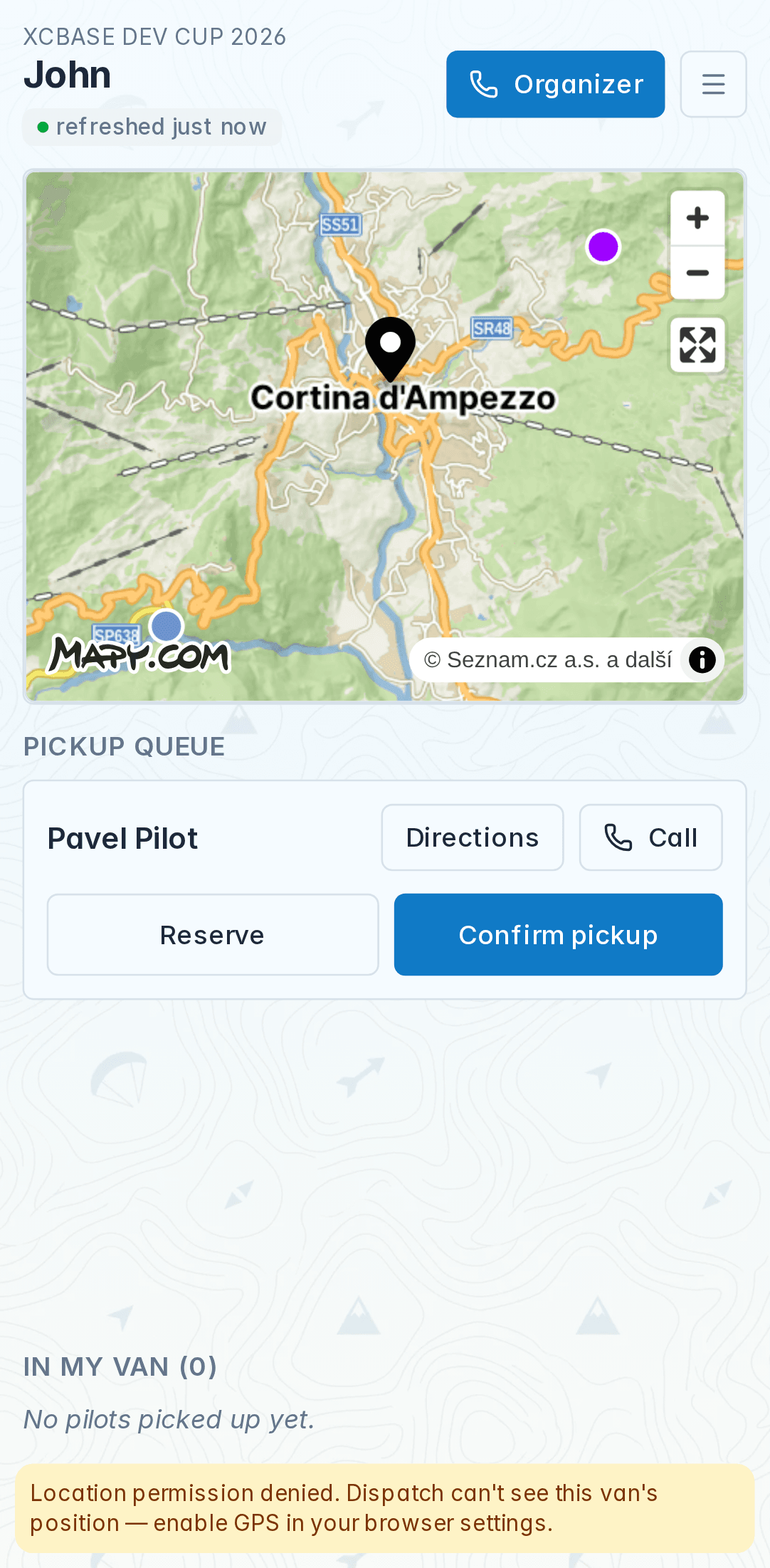 XCBase driver view on a phone showing the one-tap call button and the pilot pickup list